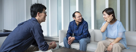 People speaking around a table